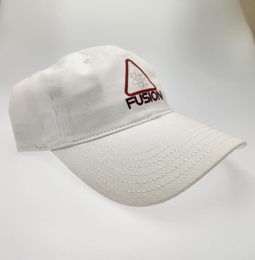 A white hat with the word fusx on it.