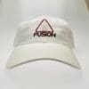 A white hat with the word fusion on it.