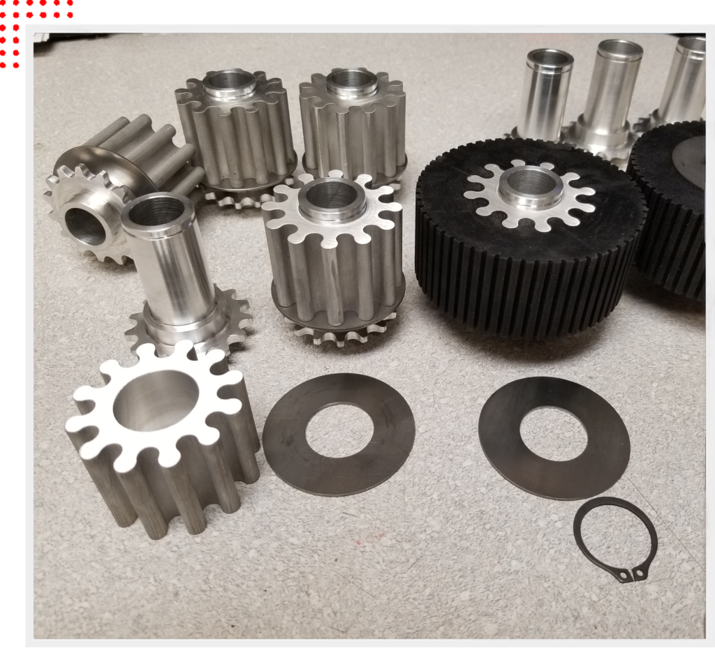 A table with some gears and other parts