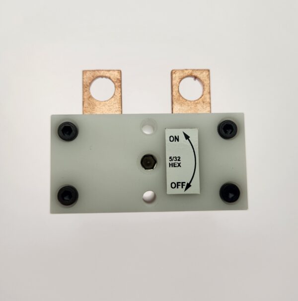 A white block with two copper contacts and one on / off switch.